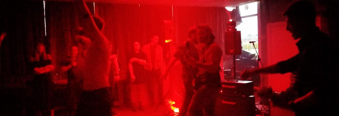 blacmarket band playing with a red light